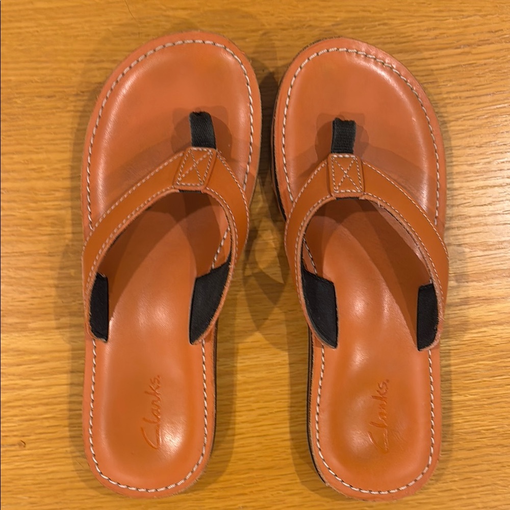 Clarks Orange leather flip flops with fabric toe Straps and Contoured Footbed